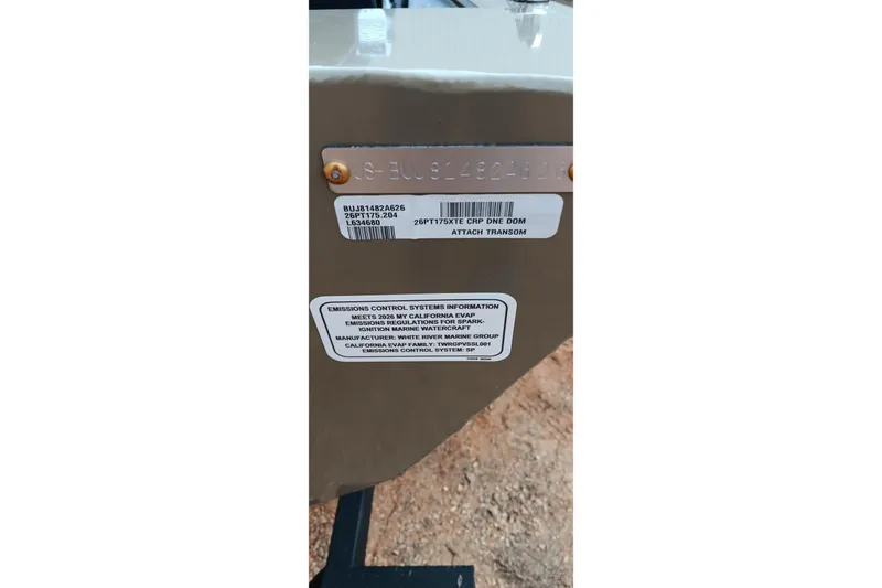 Slide: The Image of 2026 Tracker Pro Team 175 Crappie Edition boat transom with emissions control label. - 14