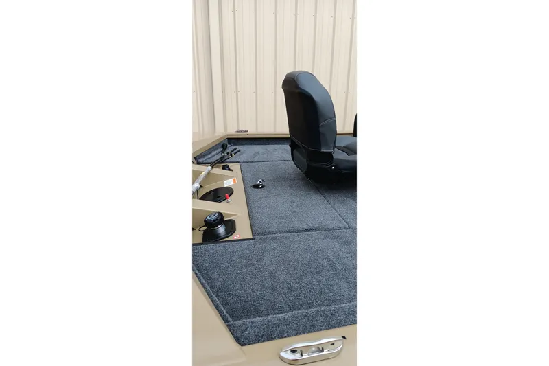 Slide: The Image of 2026 Tracker Pro Team 175 Crappie Edition boat interior with seating and fishing rod holders. - 4