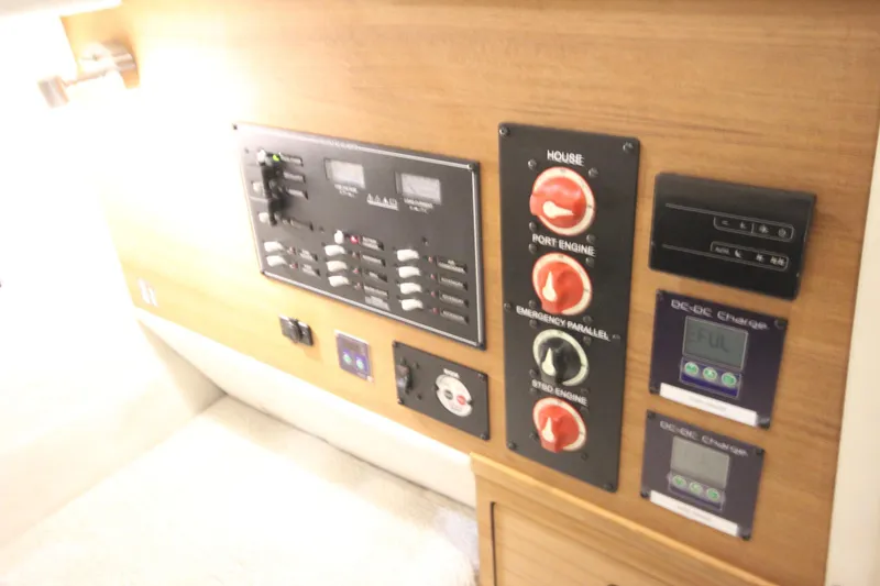 Slide: The Image of Electrical control panel of 2026 Ranger Tugs R-27 boat interior. - 19