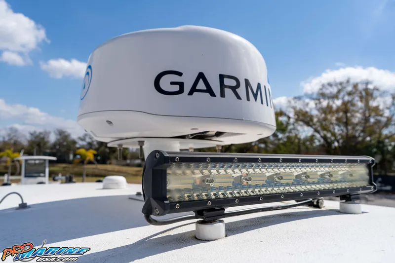 Slide: The Image of Garmin radar and light bar on 2021 Sea Hunt Ultra 229 boat. - 33