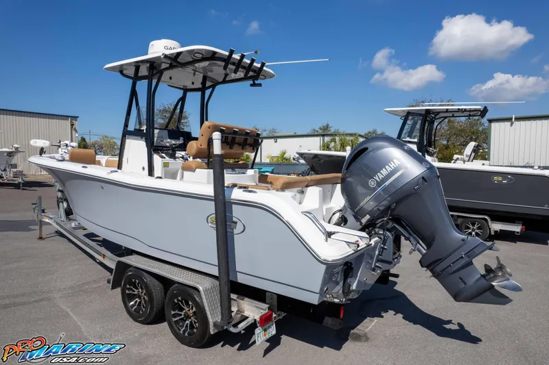 Slide: The Image of 2021 Sea Hunt Ultra 229 boat with Yamaha engine on trailer, outdoor display. - 41
