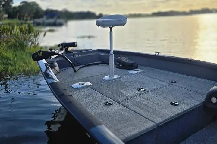 Slide: The Image of 2020 Tracker Pro Team 175 TF boat on a serene lake at sunset. - 20