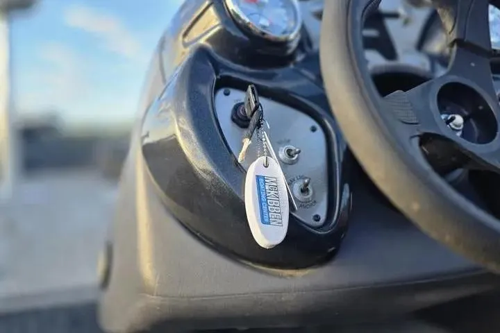 Slide: The Image of 2020 Tracker Pro Team 175 TF dashboard with key and steering wheel. - 25