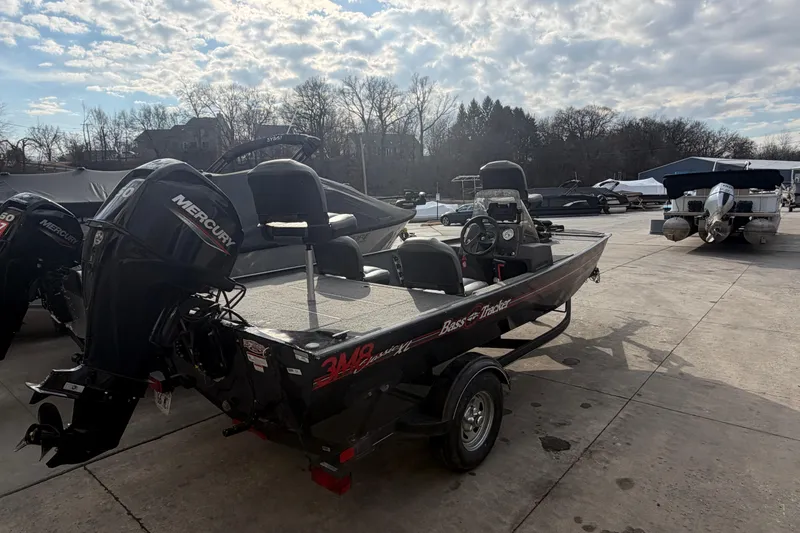 Slide: The Image of 2020 Tracker Bass Tracker Classic XL boat with Mercury engine on a sunny day. - 9