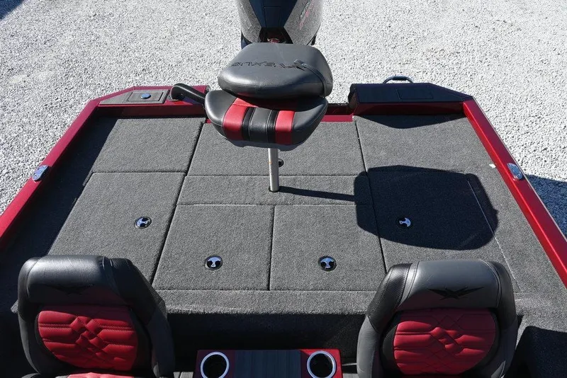 Slide: The Image of 2026 Vexus AVX 2100 boat interior with red and black seating and carpeted deck. - 10