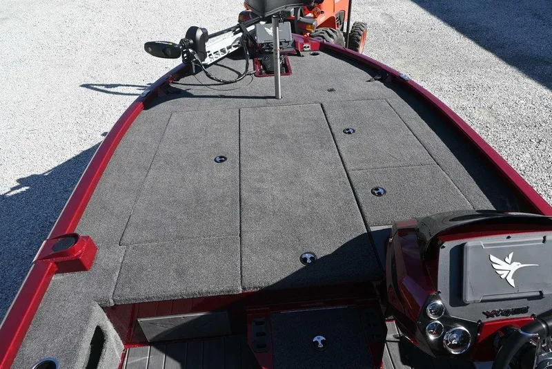 Slide: The Image of 2026 Vexus AVX 2100 boat deck with gray carpet and red trim. - 12