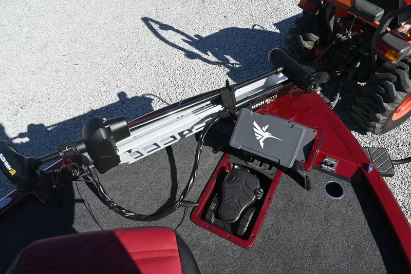 Slide: The Image of 2026 Vexus AVX 2100 boat deck with Minn Kota trolling motor and control panel. - 4