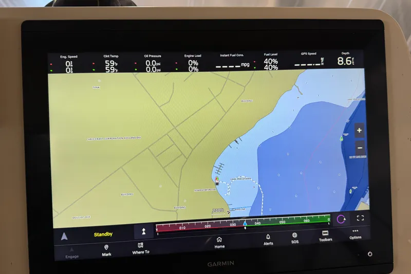 Slide: The Image of Garmin navigation display on 2021 Sabre 42 Fly Bridge, showing map and engine data. - 21