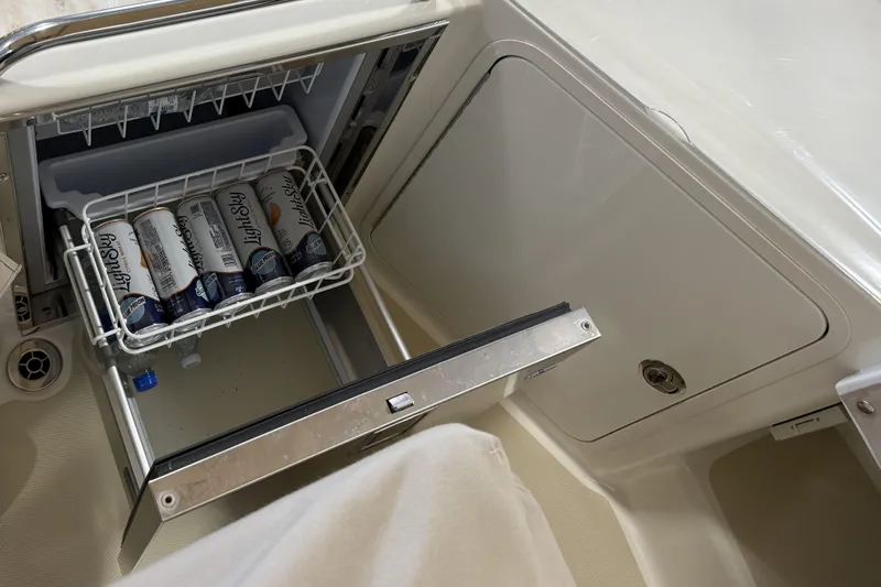 Slide: The Image of Mini fridge on 2021 Sabre 42 Fly Bridge yacht with drinks inside. - 23