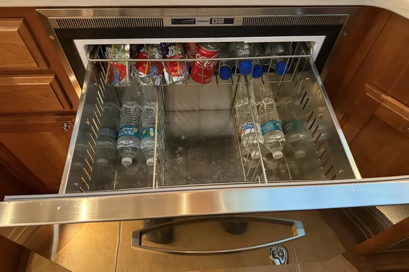 Slide: The Image of Refrigerator drawer with drinks on Sabre 42 Fly Bridge, 2021 model. - 29