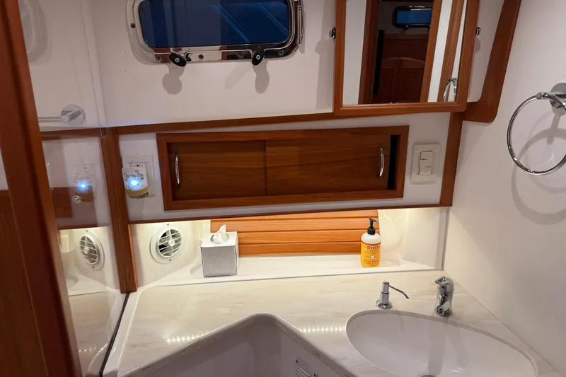Slide: The Image of Elegant bathroom interior of 2021 Sabre 42 Fly Bridge yacht with modern fixtures. - 57
