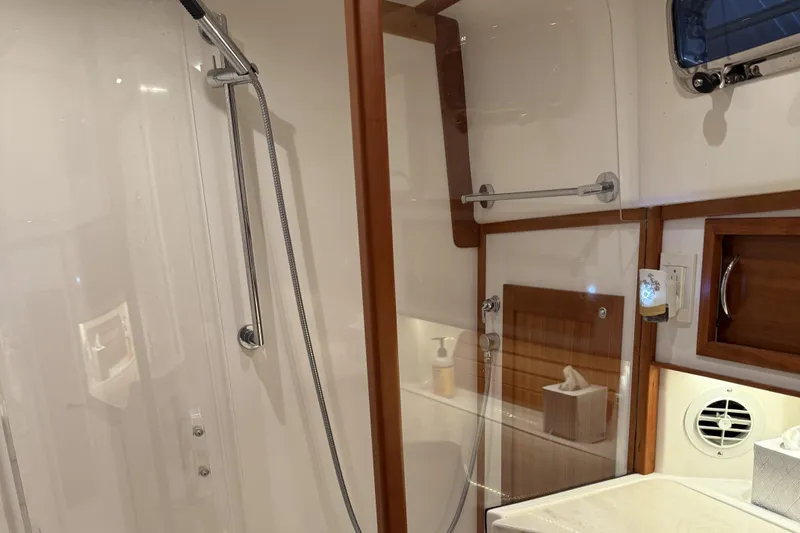 Slide: The Image of Luxurious bathroom interior of 2021 Sabre 42 Fly Bridge yacht with modern shower. - 61