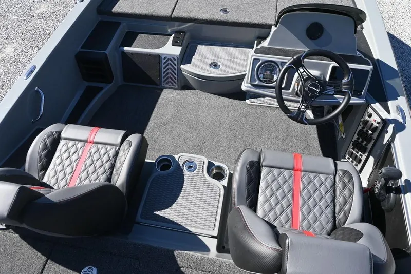 Slide: The Image of Interior of 2025 Caymas 201 Pro boat with stylish seating and modern dashboard. - 6