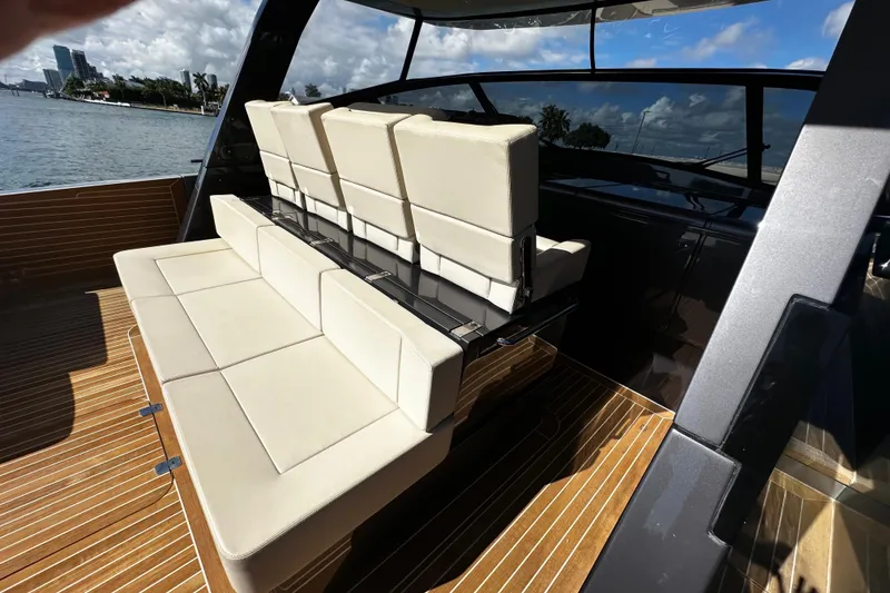 Slide: The Image of Luxurious CNM 54 yacht interior with cream leather seating, 2019 model. - 11