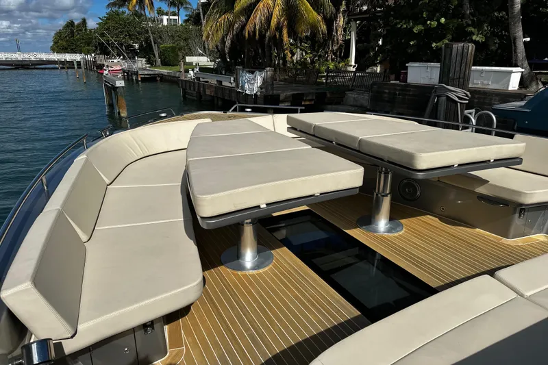 Slide: The Image of Luxurious 2019 CNM 54 yacht with spacious deck and comfortable seating. - 14