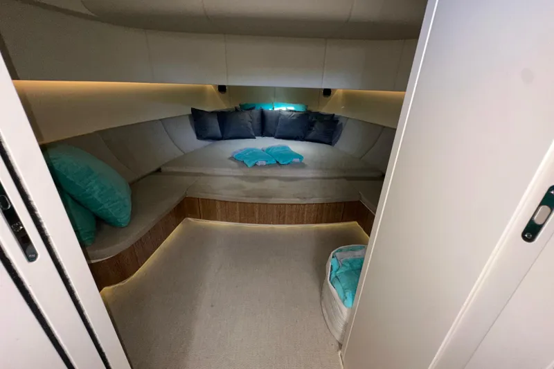 Slide: The Image of Luxurious interior of 2019 CNM 54 yacht with cozy seating and cushions. - 18
