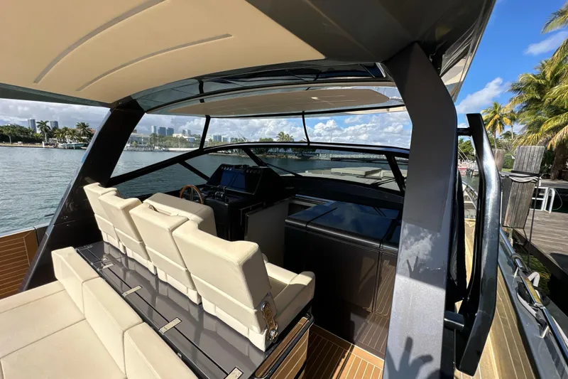 Slide: The Image of Luxurious 2019 CNM 54 yacht interior with plush seating and modern design. - 27