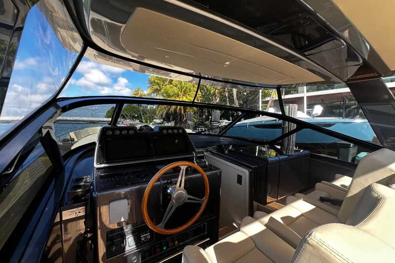 Slide: The Image of Luxurious 2019 CNM 54 yacht interior with modern helm and panoramic views. - 28