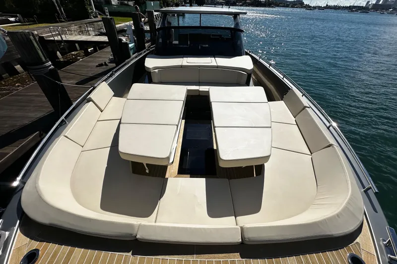 Slide: The Image of Luxurious 2019 CNM 54 yacht with spacious deck seating and elegant design. - 32