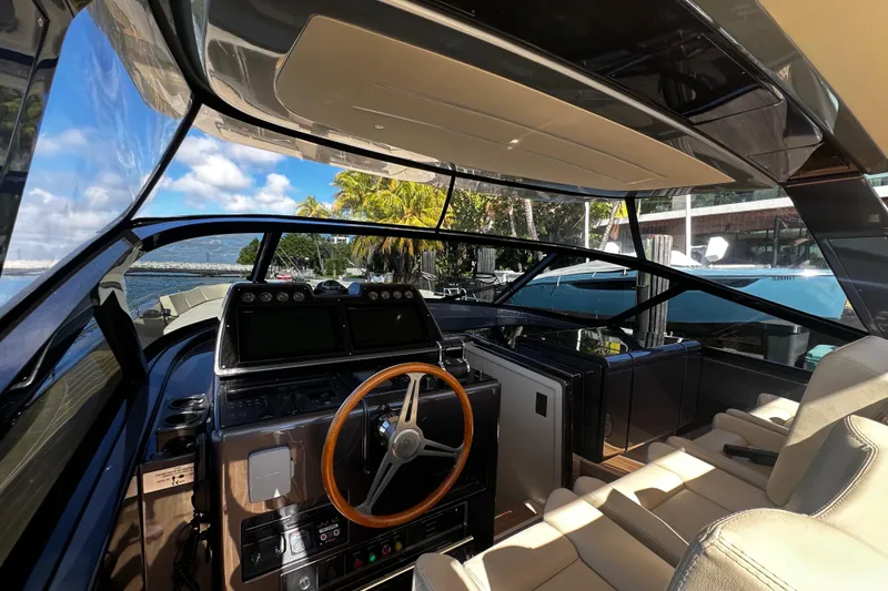 Slide: The Image of Luxurious CNM 54 yacht interior, 2019 model, featuring sleek design and advanced navigation controls. - 4
