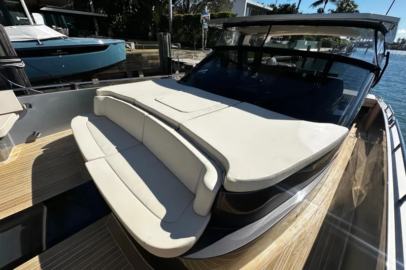 Slide: The Image of Luxurious 2019 CNM 54 yacht with spacious sun deck and elegant seating area. - 8