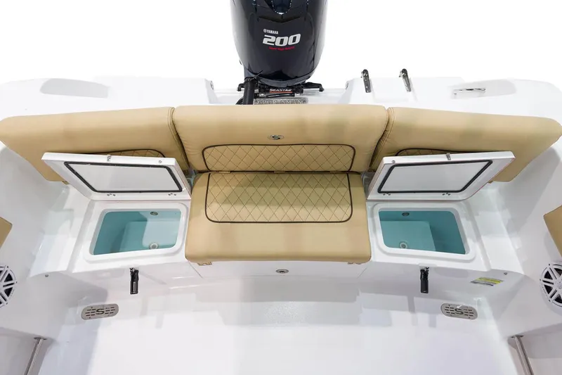 Slide: The Image of 2023 Sportsman Heritage 231 Center Console storage compartments, open and ready for use. - 18