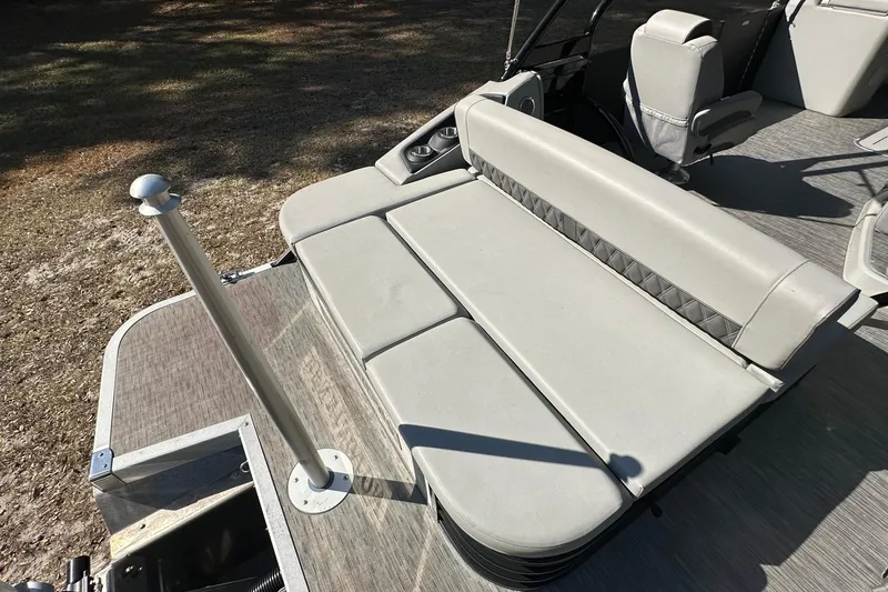 Slide: The Image of 2023 Bennington LX 26 Swingback boat with comfortable seating and sleek design. - 10