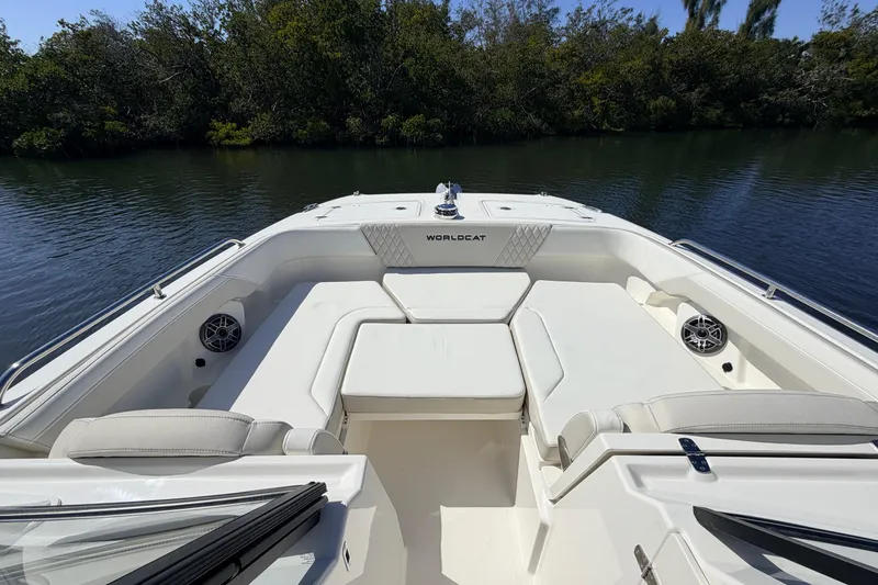 Slide: The Image of 2026 World Cat 265 DC-X boat interior with spacious seating and scenic water view. - 15