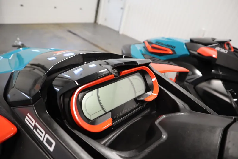 Slide: The Image of 2019 Sea-Doo Wake Pro 230 dashboard close-up in a showroom setting. - 13
