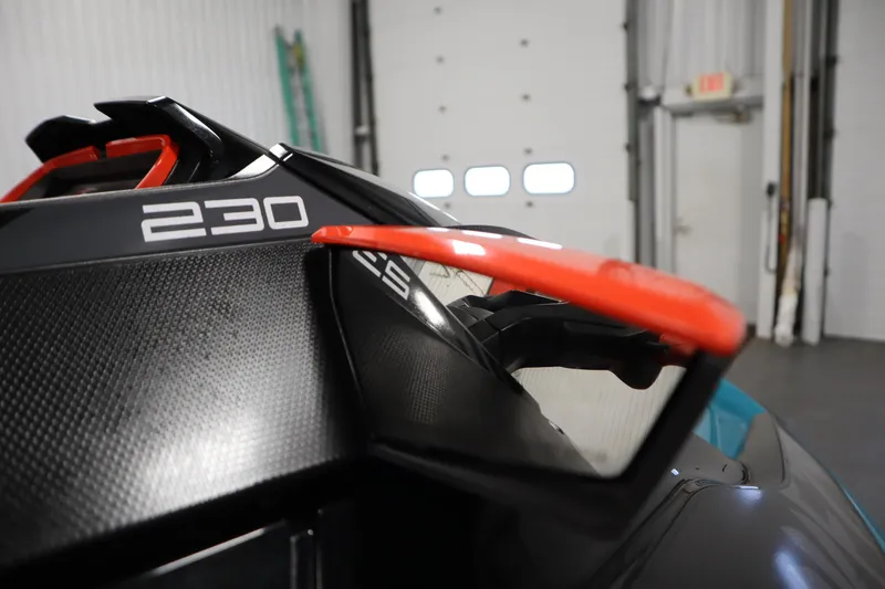 Slide: The Image of 2019 Sea-Doo Wake Pro 230 close-up, showcasing sleek design and vibrant accents. - 23