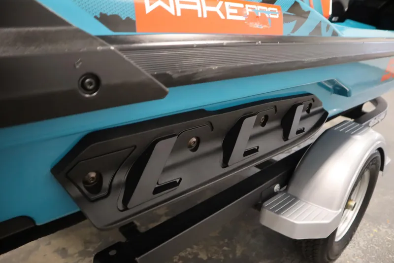 Slide: The Image of 2019 Sea-Doo Wake Pro 230, close-up of side panel and trailer. - 33