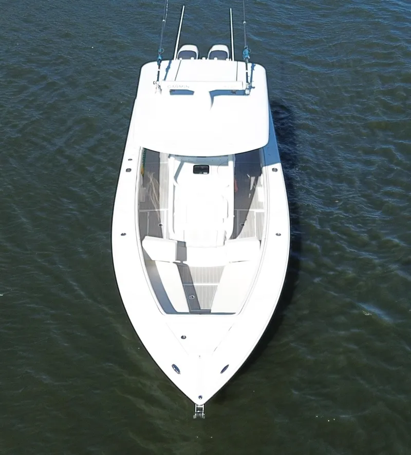 Slide: The Image of 2015 Jupiter 30 FS boat on water, aerial view. - 19