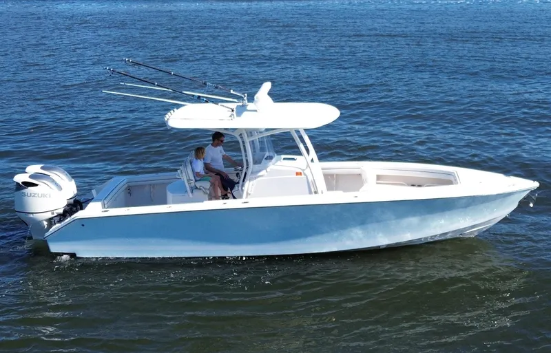 Slide: The Image of 2015 Jupiter 30 FS boat cruising on open water. - 4