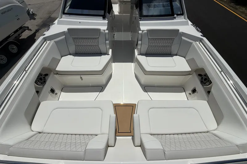 Slide: The Image of Luxurious seating area on 2026 World Cat 400 DC-X Island boat. - 16