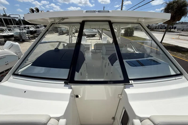Slide: The Image of 2026 World Cat 400 DC-X Island boat with spacious cockpit and modern design. - 46