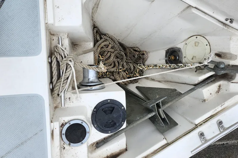 Slide: The Image of Anchor and ropes in the bow of a 1992 Catalina 36 sailboat. - 5