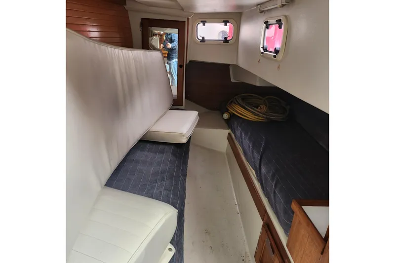 Slide: The Image of Interior of 1992 Catalina 36 sailboat with seating and storage. - 9
