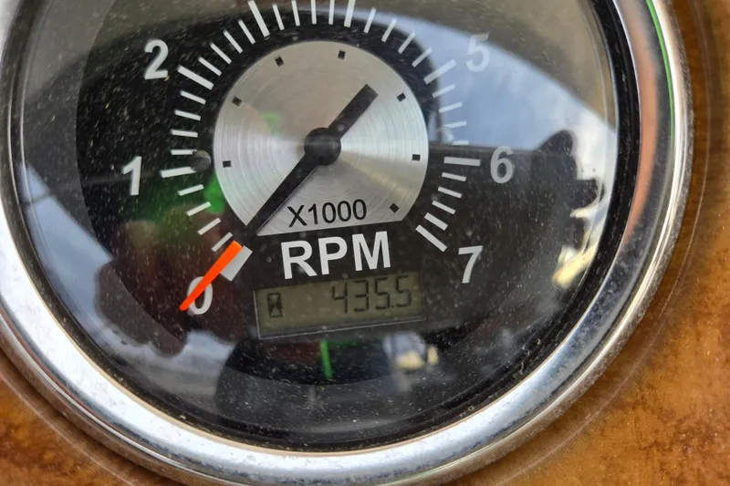 Slide: The Image of Close-up of a 2012 Berkshire 230 CL LSR RPM gauge showing 435.5 hours. - 25