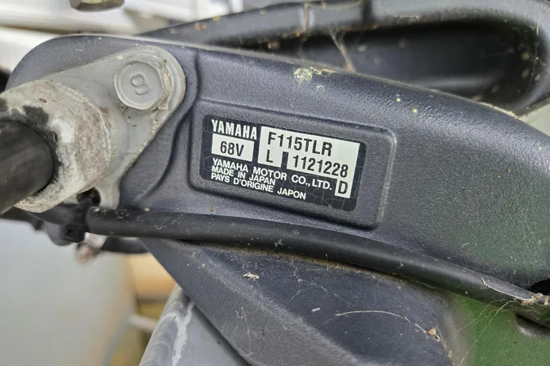 Slide: The Image of Close-up of Yamaha F115TLR engine label on a 2012 Berkshire 230 CL LSR. - 32