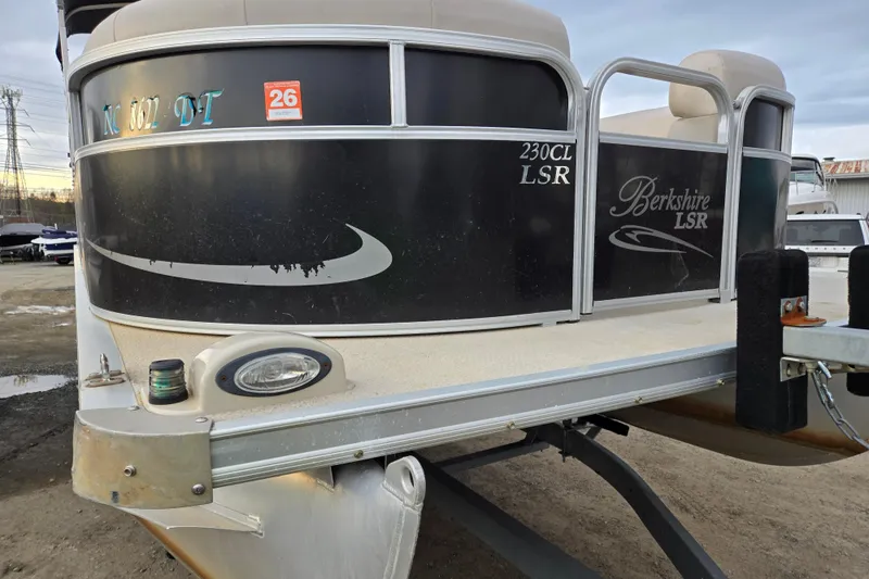 Slide: The Image of 2012 Berkshire 230 CL LSR pontoon boat on trailer, side view. - 4