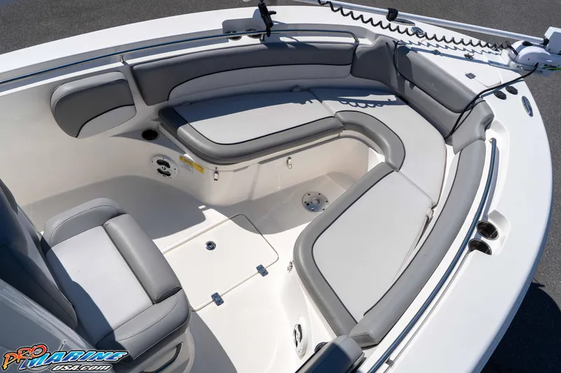 Slide: The Image of 2021 NauticStar 2602 Legacy boat interior with cushioned seating and modern design. - 28