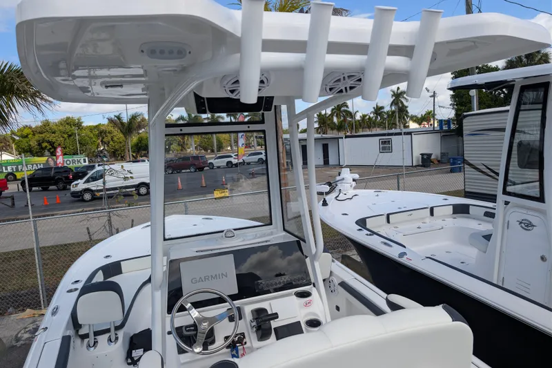 Slide: The Image of 2026 Tidewater 2300 Carolina Bay boat interior with Garmin navigation system. - 9