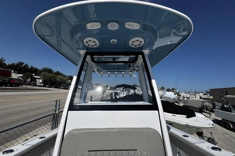 Slide: The Image of 2026 Sportsman Open 212 Center Console boat with sleek design and modern features. - 11