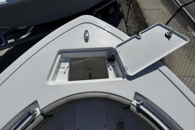 Slide: The Image of 2026 Sportsman Open 212 Center Console boat with open storage compartment. - 3
