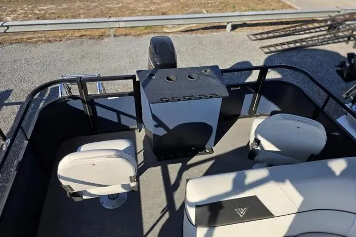 Slide: The Image of 2021 Misty Harbor Del Mar 18F pontoon boat interior with seating and console. - 13