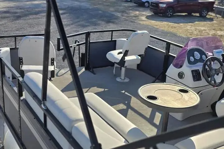 Slide: The Image of 2021 Misty Harbor Del Mar 18F pontoon boat interior with seating and steering console. - 4