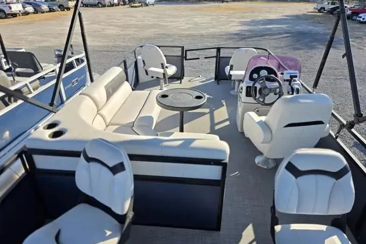 Slide: The Image of 2021 Misty Harbor Del Mar 18F pontoon boat interior with seating and steering console. - 6