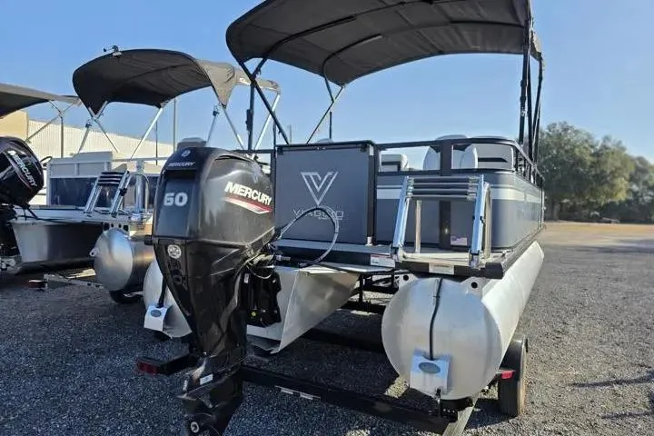 Slide: The Image of 2021 Misty Harbor Del Mar 18F pontoon boat with Mercury 60 engine, parked outdoors. - 7