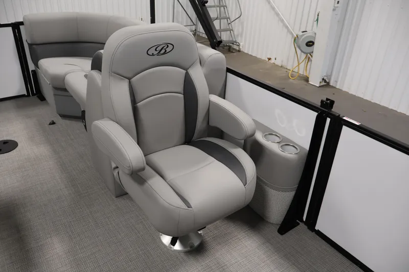 Slide: The Image of Luxurious seating on 2026 Bentley Pontoons Legacy 200 Navigator with cup holders. - 25