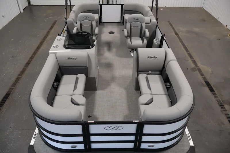 Slide: The Image of 2026 Bentley Pontoons Legacy 200 Navigator interior with luxurious seating and modern design. - 8